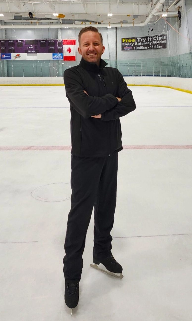 Josh Bindon standing at center ice at Ellenton Ice & Sports Complex